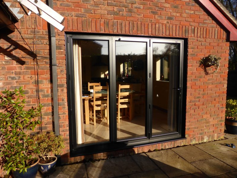 black bi fold doors closed