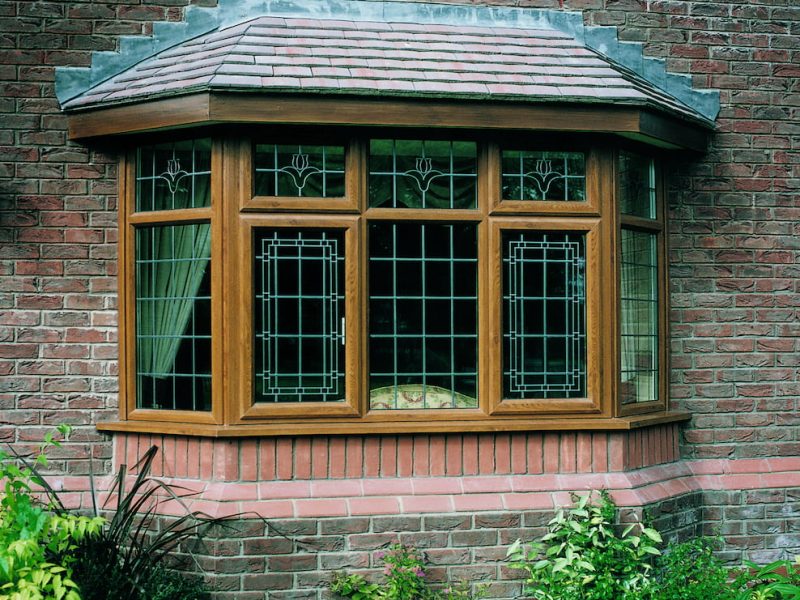 chamfered golden oak bay windows