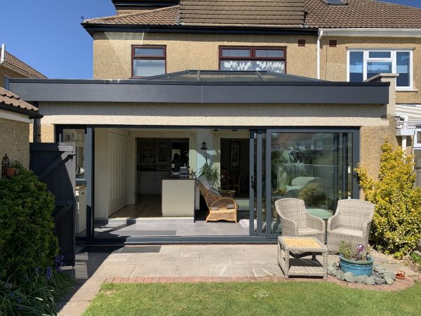 dark grey triple track patio doors