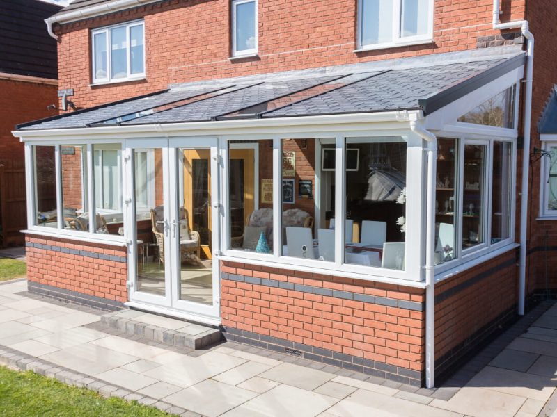 lean to conservatory with white doors